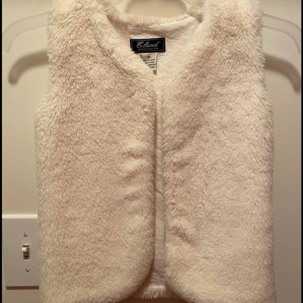 Eland cream faux fur vest.